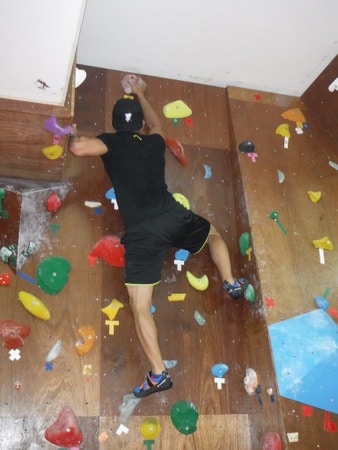 A climber at Koru Piki: Rock-Climbing Gym, Ginowan